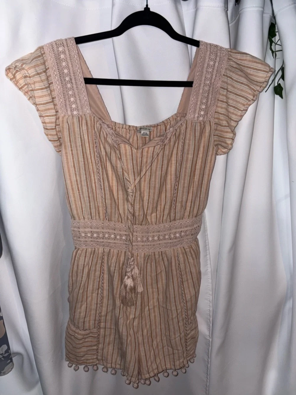 Small Striped Boho Tassel Romper in Blush Beige - Picture 1 of 3